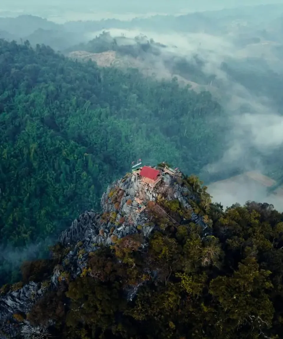 Temple on a karst peak, northern Laos
