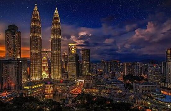 Petronas Twin Towers illuminated at night, Kuala Lumpur, Malaysia